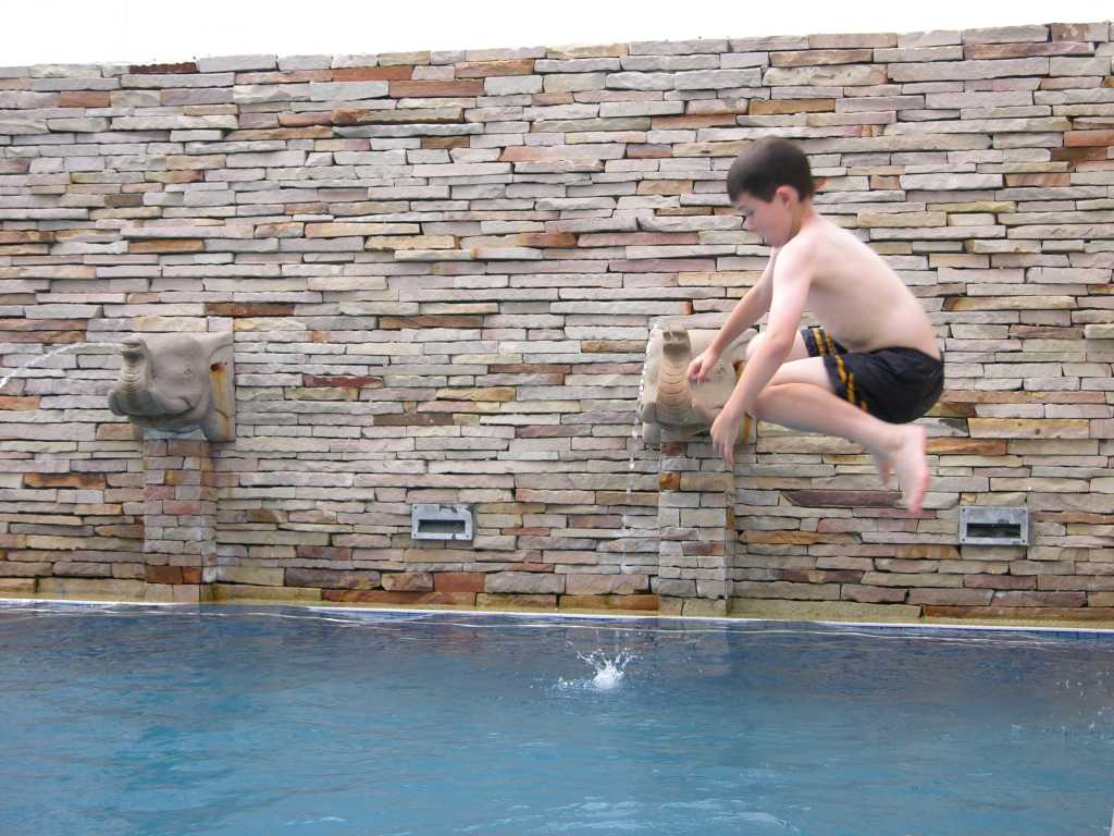 Bangkok 01 03 Buddy Lodge Swimming Pool Peter does his best levitation above the roof-top swimming pool at the Bangkoks Buddy Lodge.